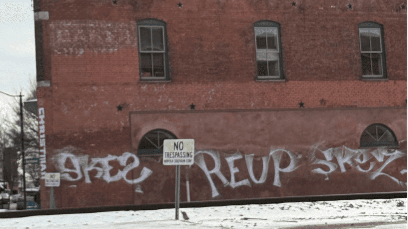 Greensboro man charged in downtown graffiti spree after anonymous tip