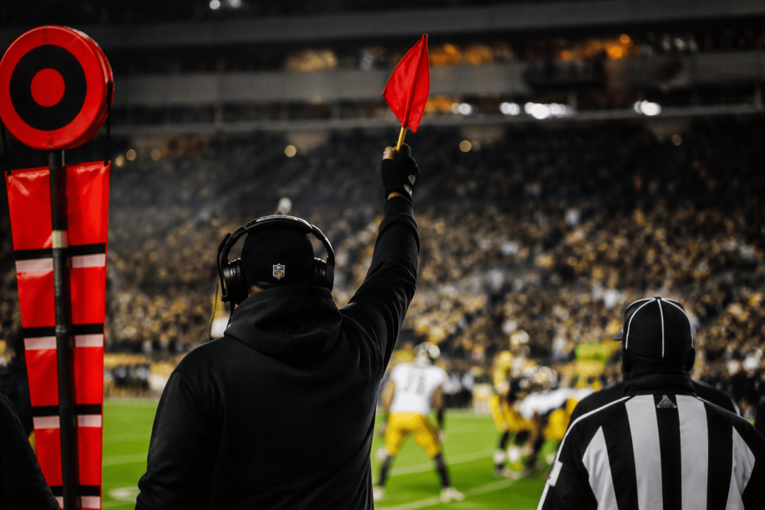 NFL weighs rule change to let staff help coaches challenge calls